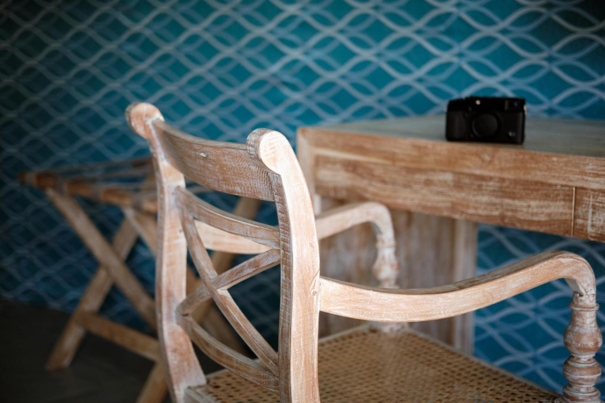 Nivadoo Resort Sigiriya Rom bilde A chair